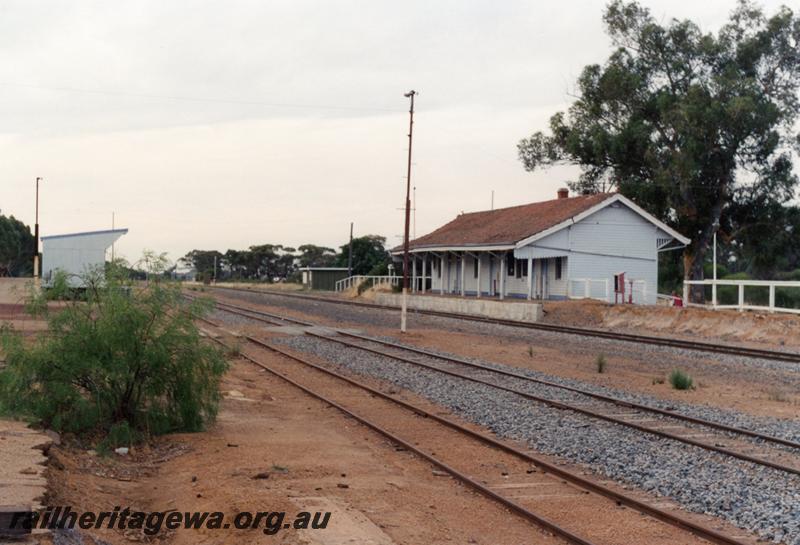 P08805
Station building, goods shed, Pingelly, GSR line, south end and trackside view of station, buildings painted blue
