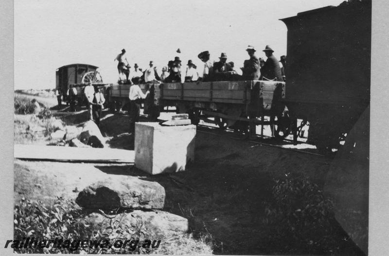 P08905
21 of 29 views of the construction of the Wyalkatchem-Lake Brown-Southern Cross railway, WLB line. Work train consisting of 3 H class wagons and a 4 wheel brakevan, with workers in the wagons
