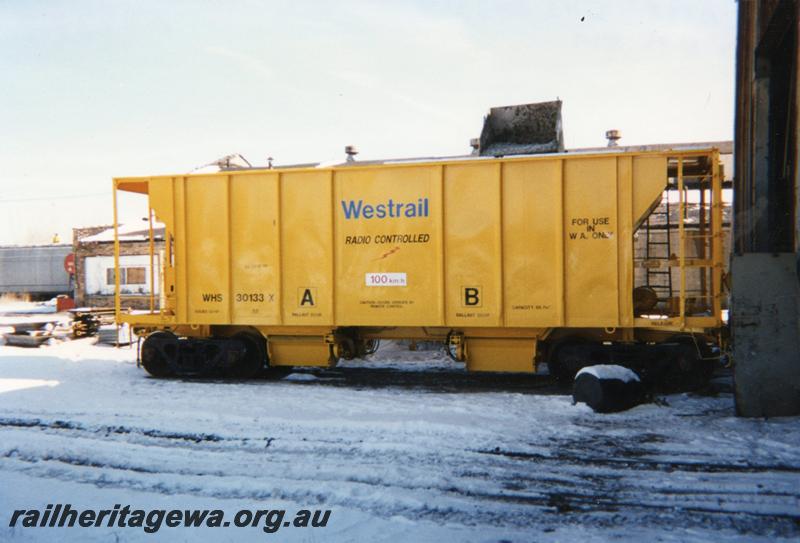 P08939
Ex ATSF WHS class 30133-X ballast hopper, side view, newly painted, photo taken in the USA
