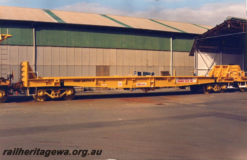 P08954
WQD class 30774-S sodium cyanide tank container wagon, (later reclassified to WQDF class), end and side view. This wagon was cut down from a WVX van, the end bulkheads being the remnants of the van's ends
