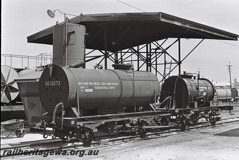 P09211
MS class 12073 loco sand tanker coupled to another MS class wagon, Bunbury loco depot, end and side view 
