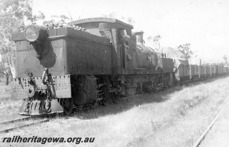 P09349
MS class 429 Garratt loco with timber plank hungry boards, bunker end and side view, class and number painted on the headstock, on a goods train, location unknown
