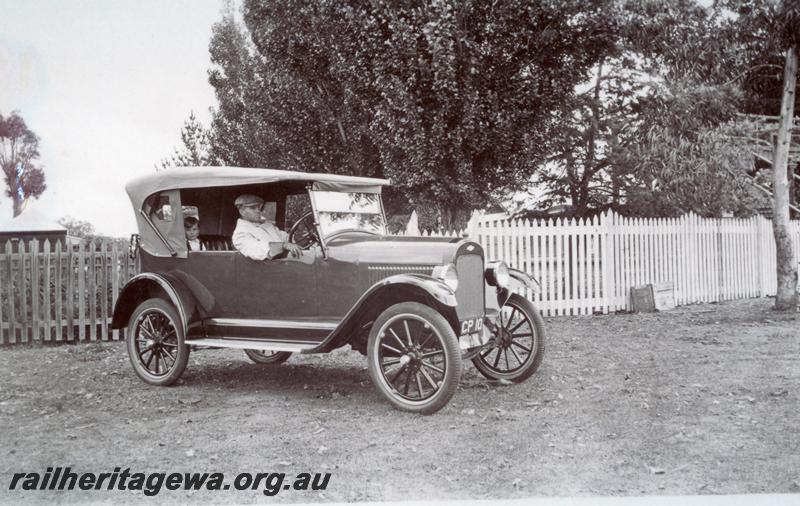 P09351
Mr Copley, station master at Boyanup from August 1921 until November 1928 in his car in front of the station masters house, Boyanup, PP line
