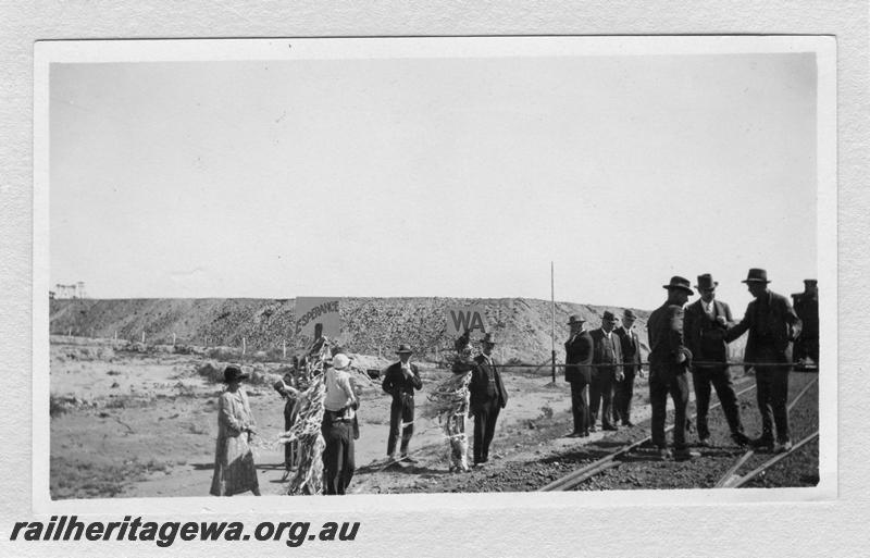 P09354
Officials standing on and around the track on the occasion of the first through train to Esperance taken at Norseman, CE line
