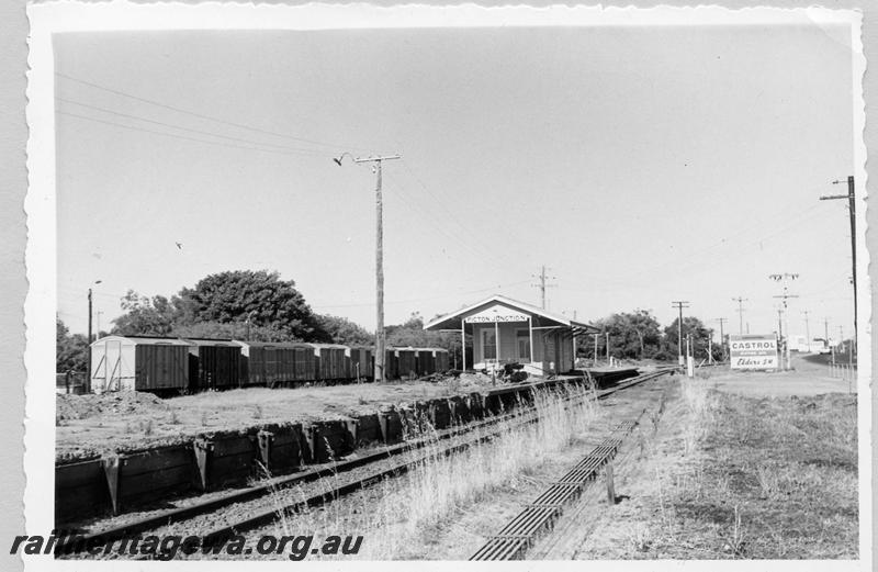 P09356
Picton Junction, station building, platform looking west, variety of vans in rear. SWR line.
