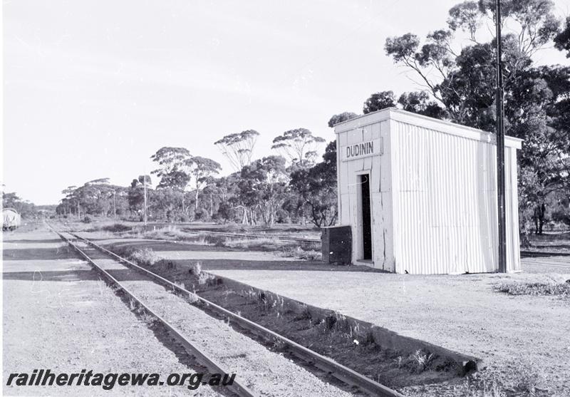 P09482
Dudinin, out of shed, platform, nameboard, wagons in siding. NKM line.
