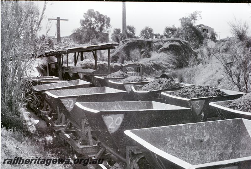 P09545
Rows of hoppers, one loaded, one empty, Maylands Brickyards 
