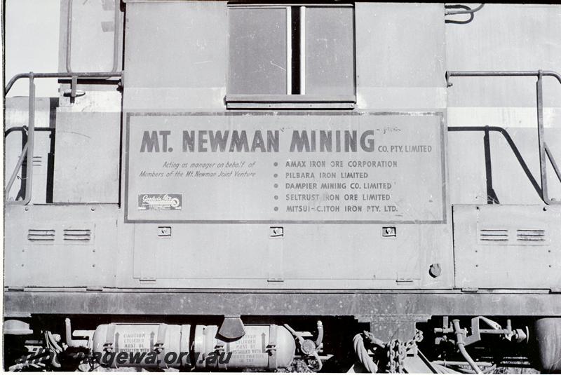 P09547
Mount Newman Mining 636 class 5467 loco, view of nameboard on cab side, photo taken at Bullsbrook, loco on a low loader 
