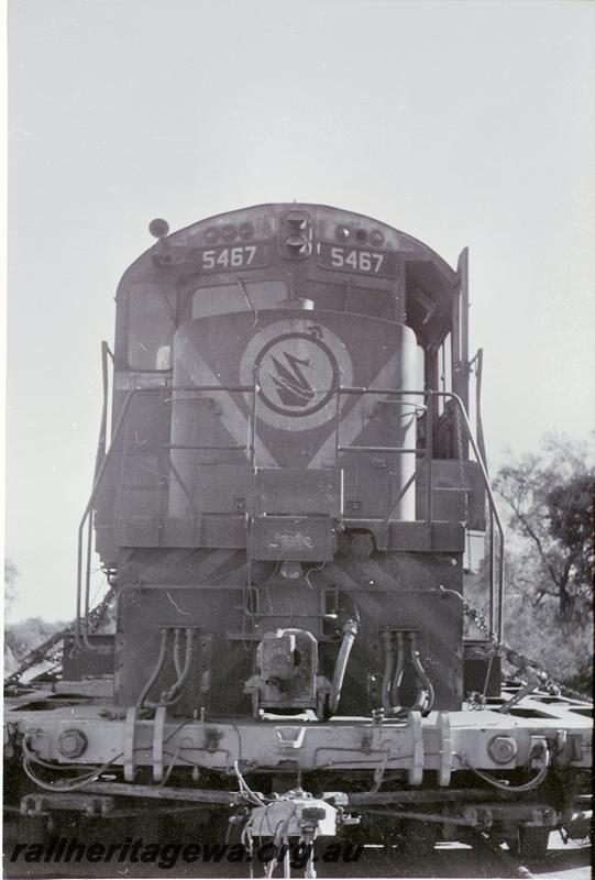 P09548
Mount Newman Mining 636 class 5467 loco, front on view, photo taken at Bullsbrook, loco on a low loader 
