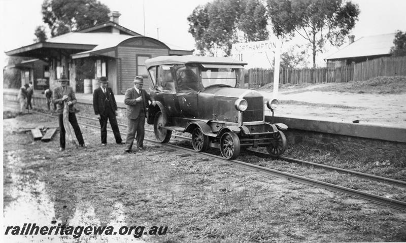 P09552
Dort rail mounted inspection car, station buildings, Northampton, GA line, side and front view of car, station master's house in the background
