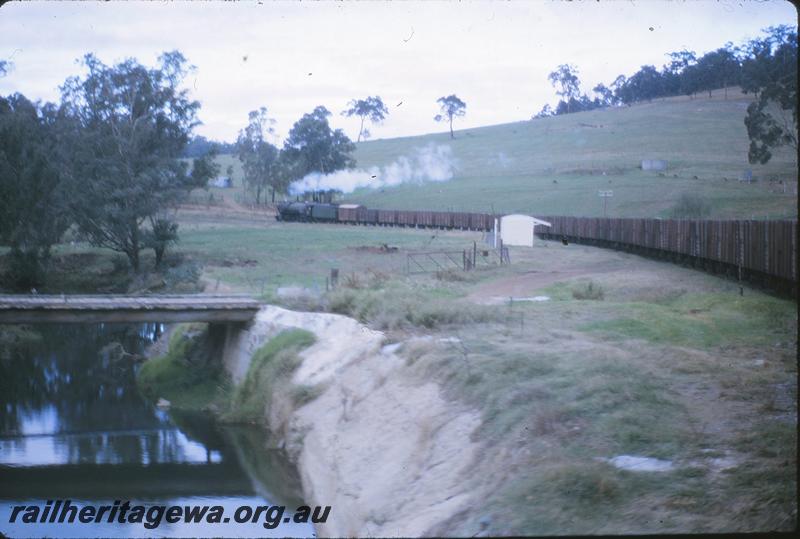 P09660
V class 1215, goods train, goods shelter, Olive Hill. Coach attached special Collie to Bunbury. BN line.
