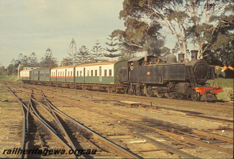 P09803
DM class 581 on suburban train, three different liveries on carriages, entering Claremont. ER line.

