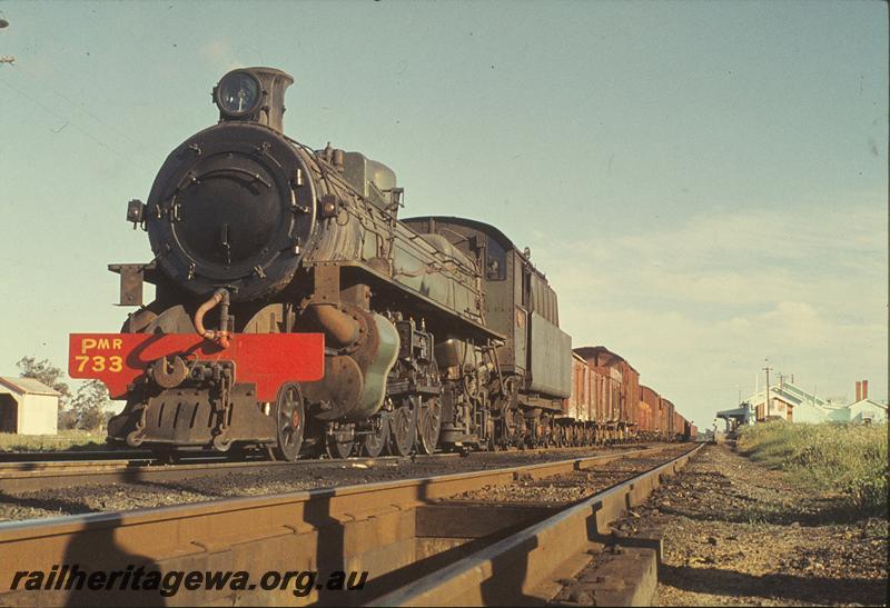 P09820
PMR class 733, on up goods, station building, platform, signals, taking water, Pinjarra. SWR line.
