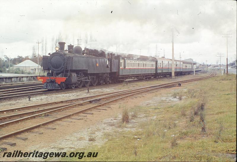 P09866
DM class 585, down show special, loading bank, station building, platform in background, semaphore signals, Welshpool. SWR line.
