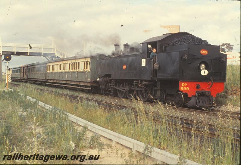 P09872
DD class 599, up show special, ACL class carriages, colour light signal, footbridge, approaching Daglish. ER line.
