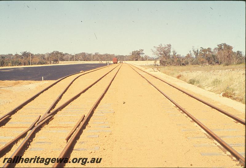 P09879
Bibra Lake, new yard, hard stand for interchange, standard gauge in background. FA line.
