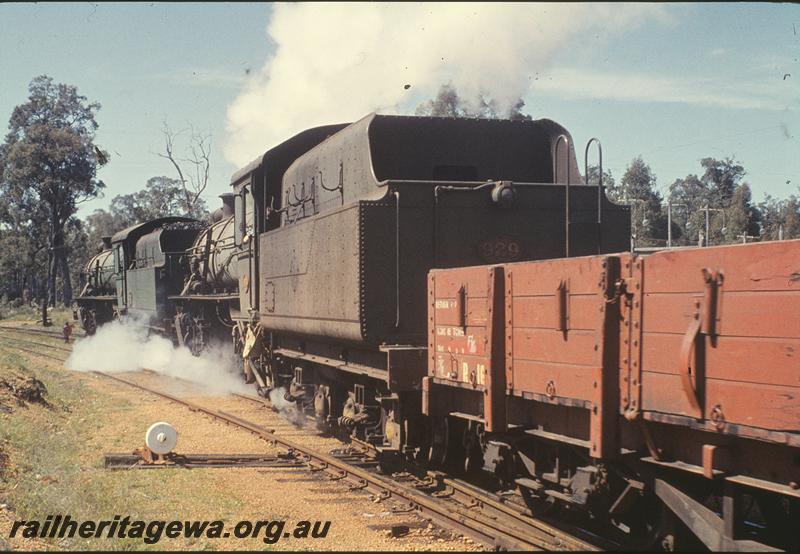 P09904
W class 958, W class down goods, departing loop, Greenbushes. PP line. First half of a R class open bogie wagon is seen behind the loco showing the details of the side stanchions, door strapping and door springs.
