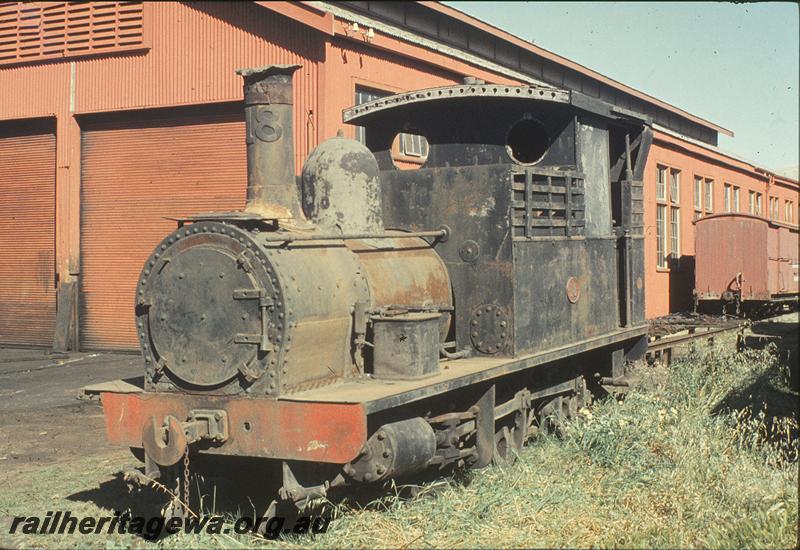 P09933
H class 18, derelict at Bunbury loco shed, workshop shed in background. SWR line.
