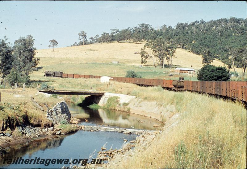 P09968
V class 1214, from ACL class carriage of coach attached tour, shelter shed, Olive Hill. BN line.
