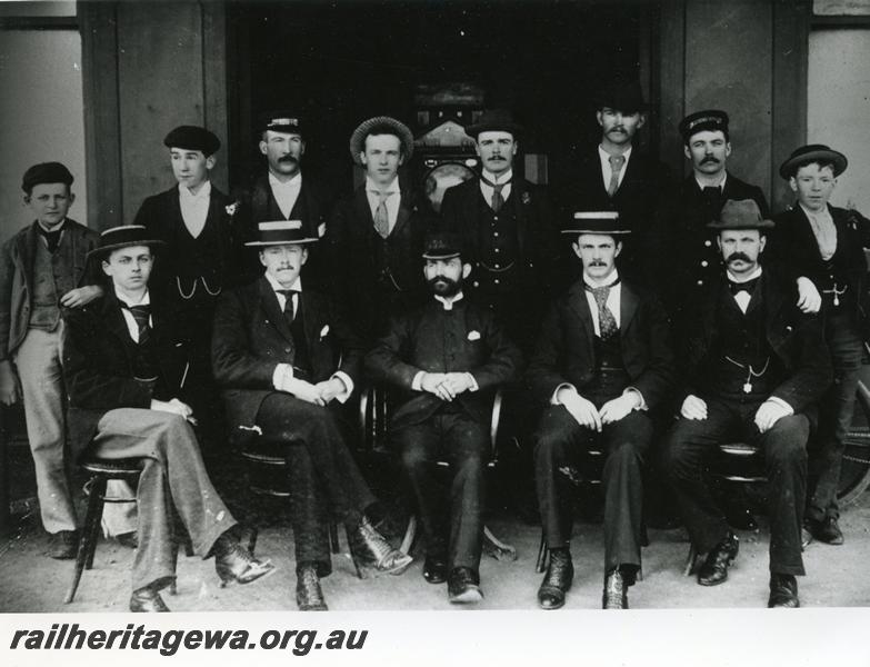 P10008
Station staff, group photo, location Unknown, station master seated in the middle of the front row
