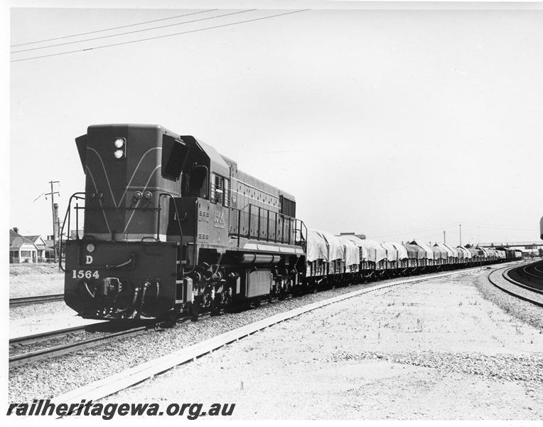 P10087
D class 1564, passing the East Perth Terminal, goods train
