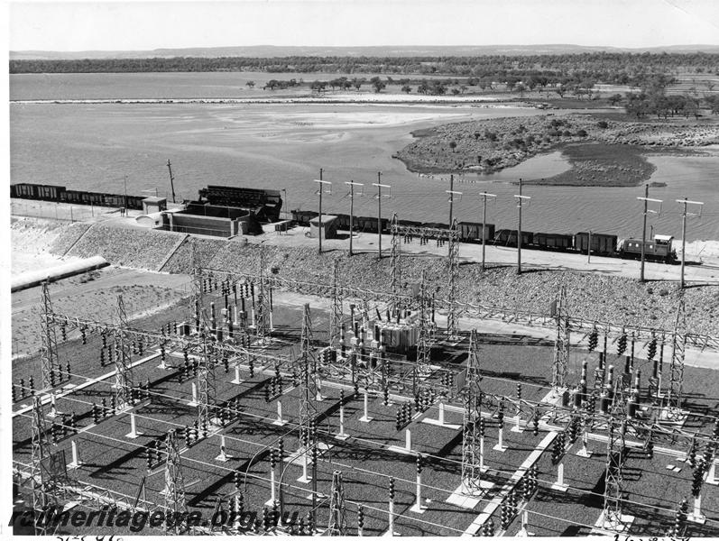 P10165
SEC diesel loco pushing loaded wagon over the wagon tippler, Bunbury Power Station, elevated view of site.
