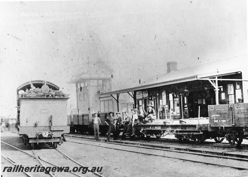 P10174
E class 335, Q class 4458 bogie bolster wagon, station building, signal box, Southern Cross, ER line, view of rear of tender. c1903-12
