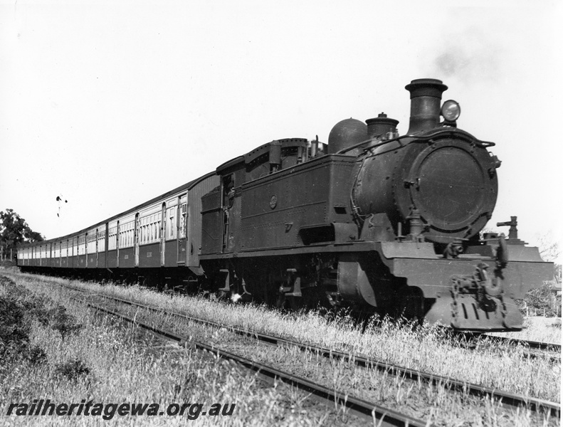 P10230
DS class loco hauling AYB class and AY class suburban carriages. Possibly a trial run of new carriages, side and front view of the train
