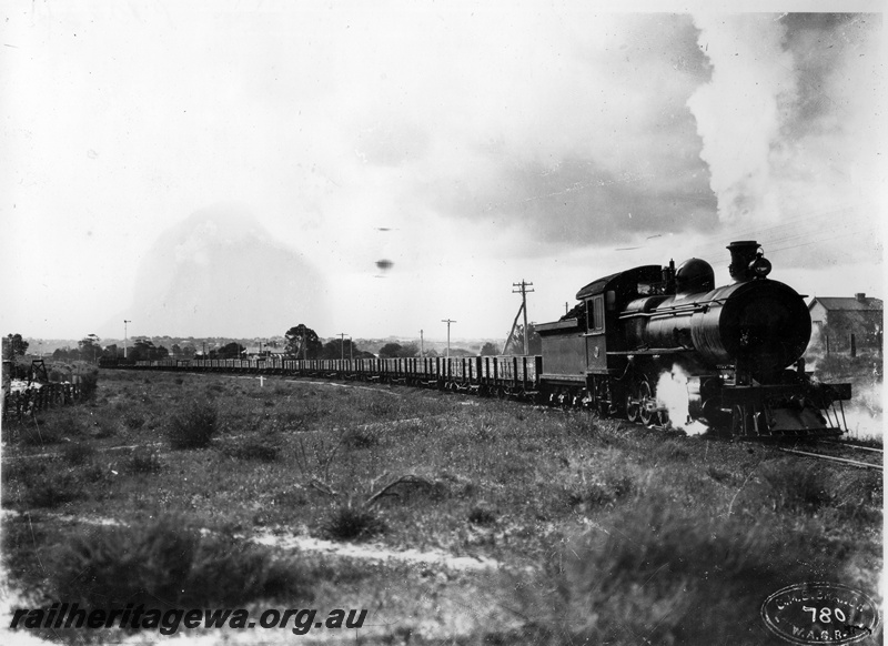 P10234
F Class 418 loco hauling a train of open wagons, location unknown, c. 1912
