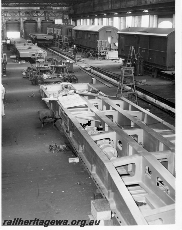 P10238
WF class standard gauge flat wagon (later reclassified to WFDY),under construction in the Car Shop, Midland Workshops, elevated view along the shop.

