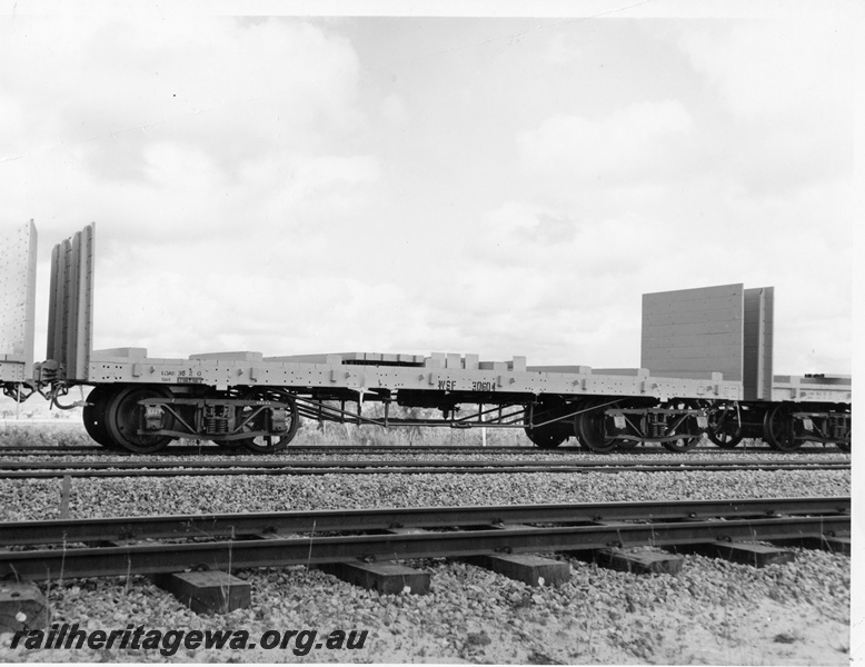 P10248
WSF class 30604 standard gauge flat wagon with end bulkheads, side view
