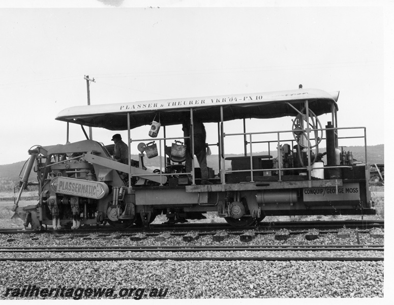 P10253
Plasser track tamping machine, working, side view
