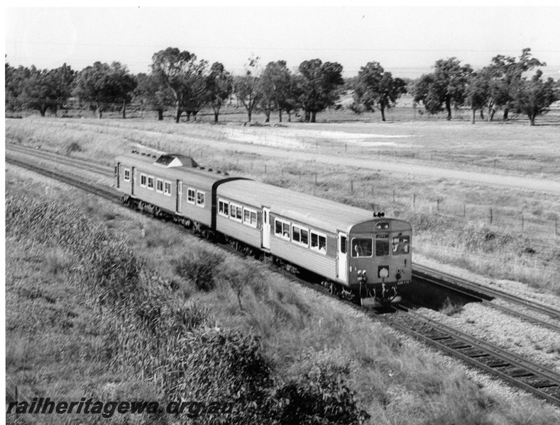 P10298
ADB/ADK class railcar set, elevated view from the Kalamunda over bridge, High Wycombe, side and front view
