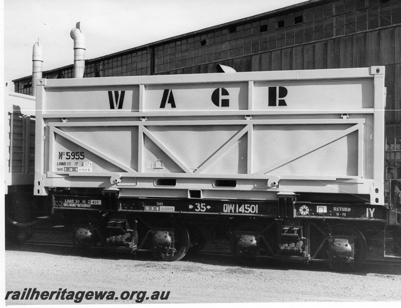 P10361
QW class 14501, Black with White lettering, formerly W class Steam Locos tender frame fitted with twist locks to carry one container with side unloading capability, painted yellow with black lettering for carrying mineral sands. 
