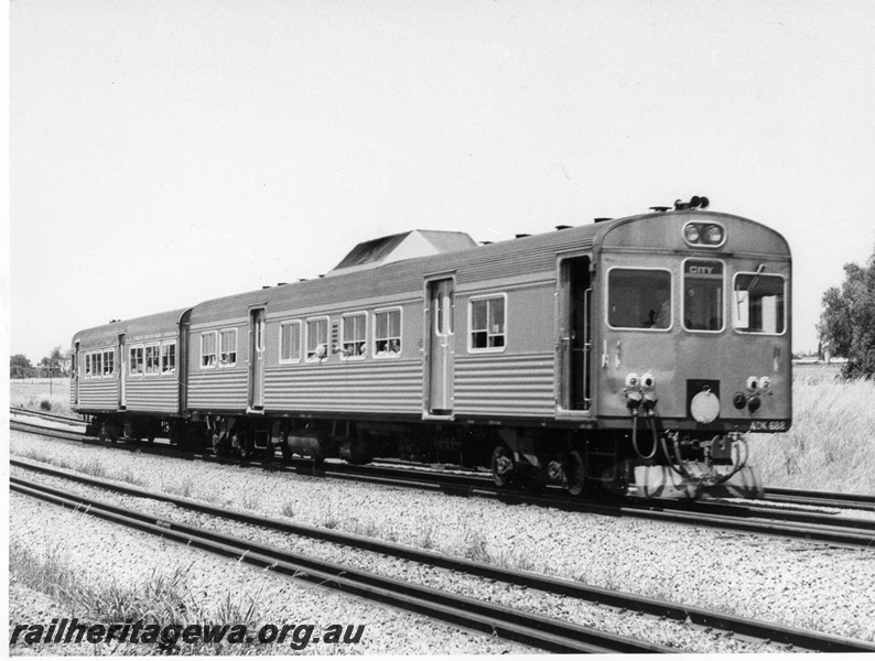 P10371
ADK class 688 suburban diesel railcar and trailer, side and front view.
