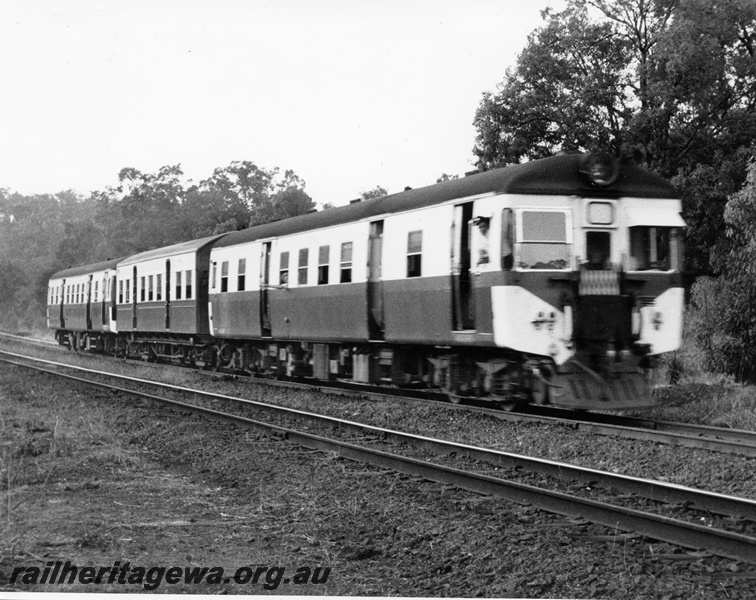 P10374
ADG class suburban diesel railcar with AYE class carriage in the consist, side and front view.
