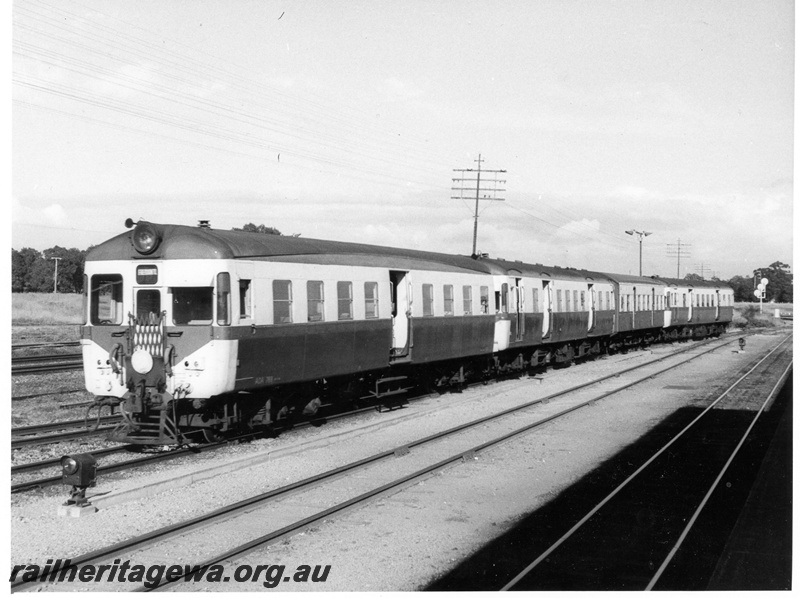 P10378
ADA class suburban railcar trailer on a suburban train, front and side view.
