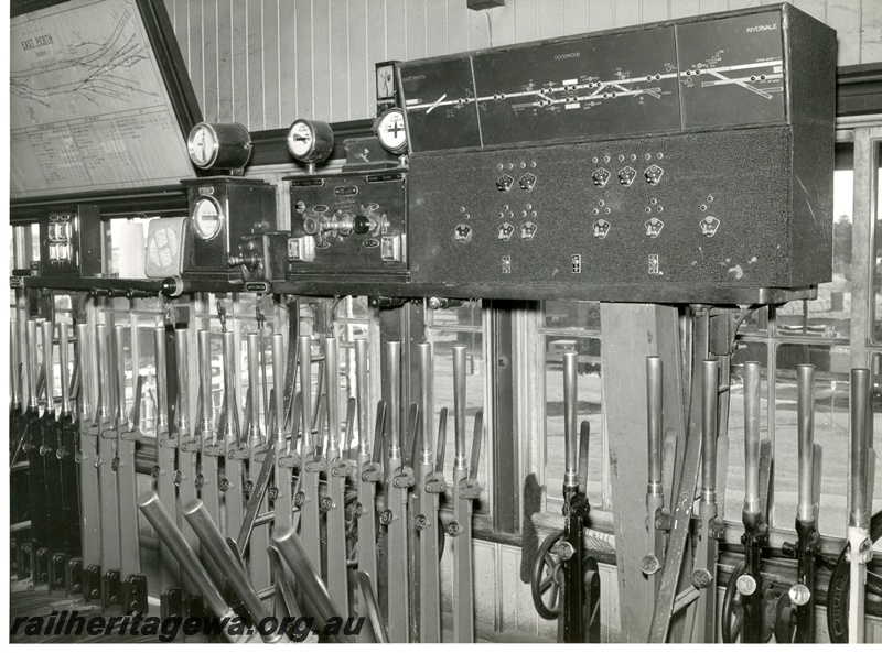 P10384
East Perth Signal Box, interior view, showing signal levers and CTC Panel for Goodwood-Rivervale section. 
