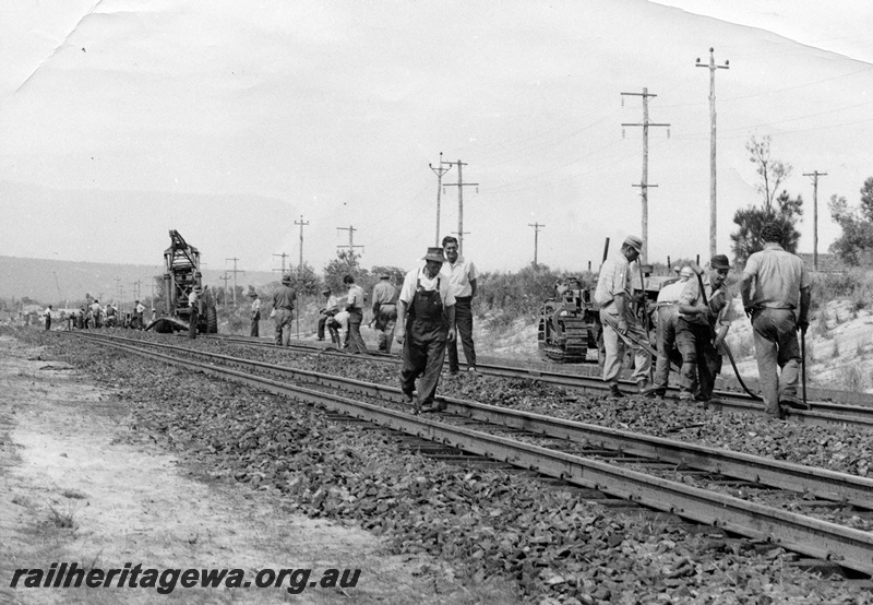 P10388
Track gang relaying track near Pingelly on GSR line.
