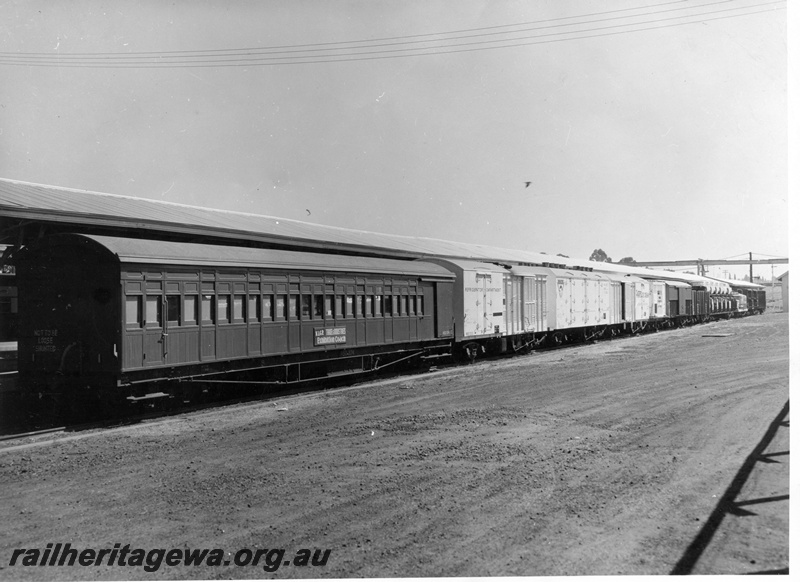 P10390
A rake of assorted wagons, including ASD class 374 exhibition coach, WVD class 23131 with a 