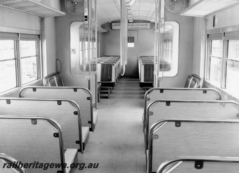 P10393
Interior view of ADB class railcar showing electric fans and crush barriers. Same as P10420.
