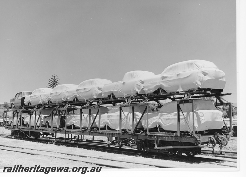 P10521
QMB class 20001 car carrying wagon with a load of new car bodies at Cottesloe. End and side view of wagon.
