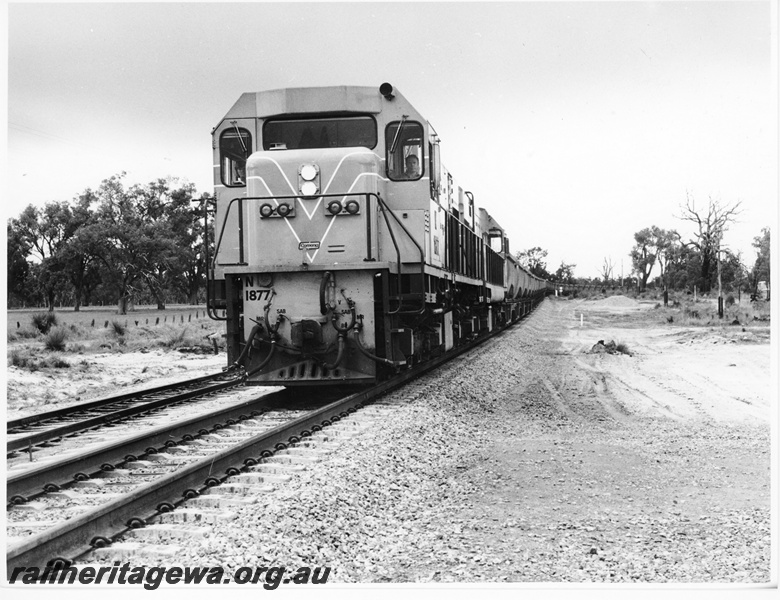 P10533
1 of 2 N class 1877 diesel locomotive hauling a bauxite train between Kwinana to Mundijong. Front view of locomotive.
