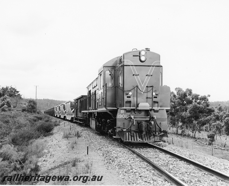 P10535
R class 1901 diesel locomotive hauling a bauxite train between Mundijong and Jarrahdale. Good front view of locomotive.
