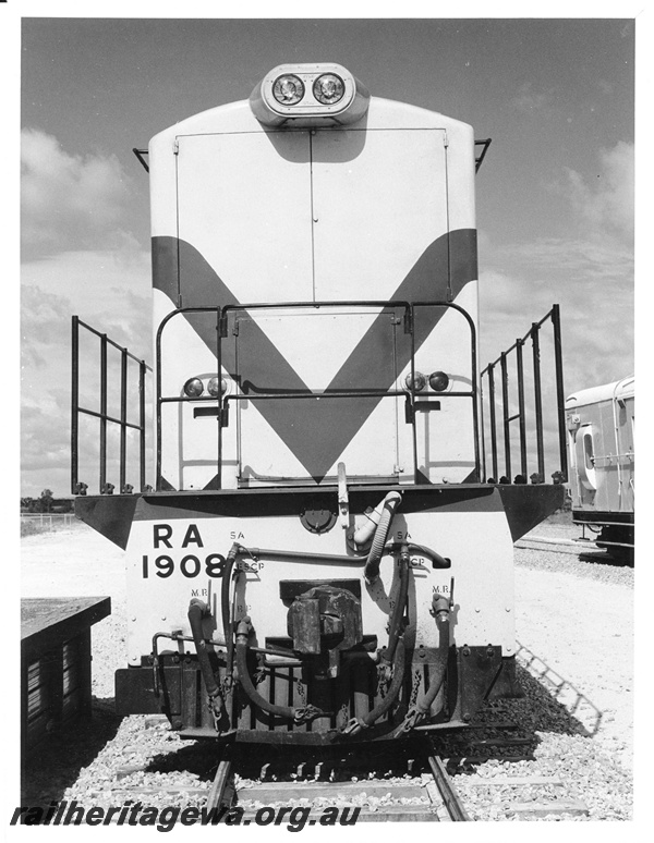 P10553
RA class 1908 diesel locomotive, front view, shortly after repaint into the Westrail colour scheme. Of note is no white lining between blue lining and main colour.
