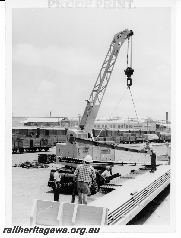 P10557
Loading galvanised sheet iron onto wagon QMD20059 at North Fremantle.
