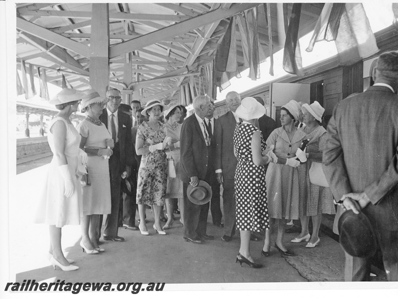 P10584
1 of 2. Guests being shown the Exhibition Train at Kalgoorlie Railway Station.
