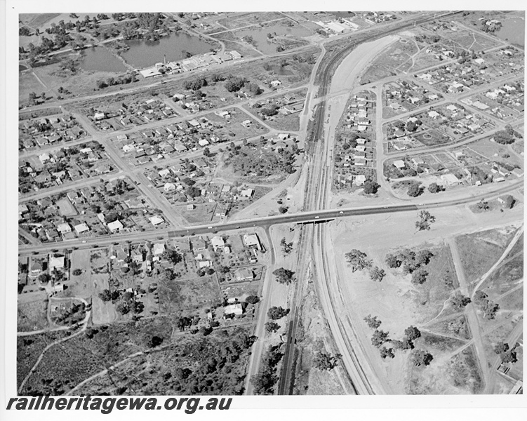 P10586
Overhead view of the Great Eastern Highway Overbridge at Bellevue. Straight Trackage under the bridge is the narrow gauge line to Chidlow and Northam while the curved track is the new standard gauge line under construction. 
