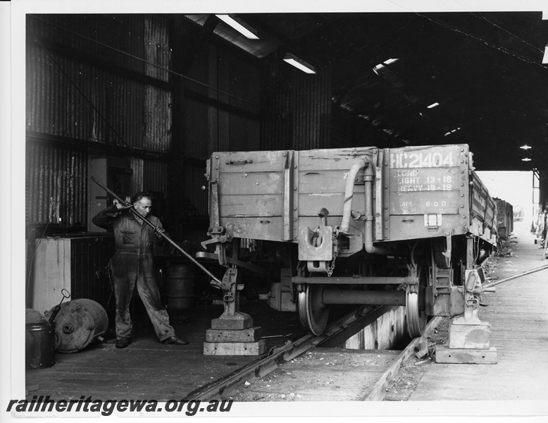 P10609
HC class 21404 low sided open wagon being raised by hand jacks to allow for a full wheel & axle change out.
