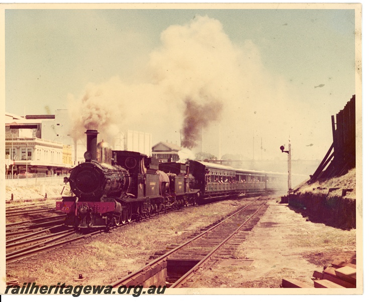 P10648
G class 233, with another G class loco tender first, double heading excursion train of period carriages, signal, signal box, track pit, departing Perth, front and side view
